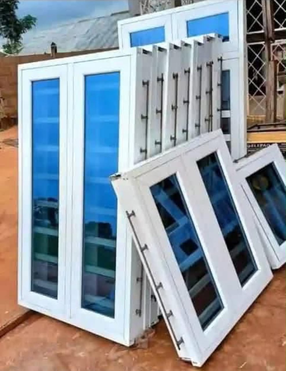 White aluminum casement and louvre windows ready for installation